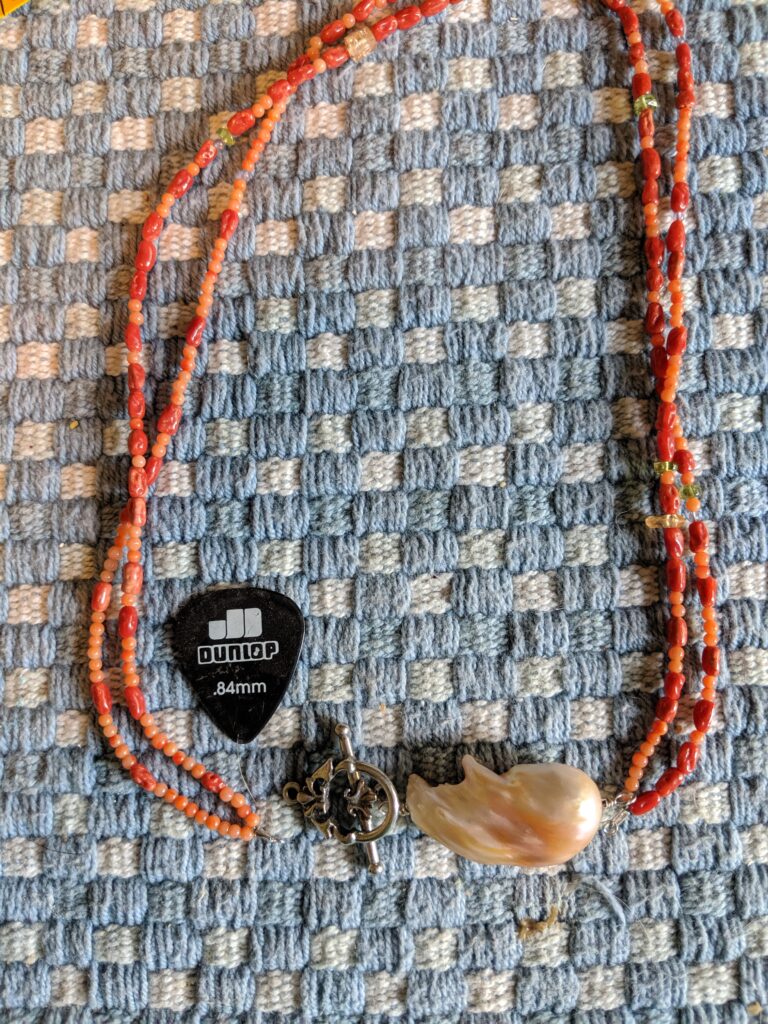 Wedding present of coral and flameball pearl 